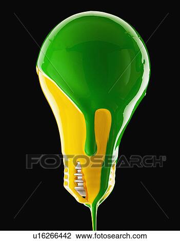 Stock Image - Studio shot of light bulb covered with yellow and green paint. Fotosearch