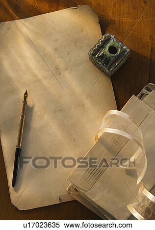 Stock Photography - Studio shot of pen, ink well and envelops. Fotosearch