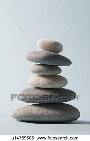 Stock Photography - Studio shot of rocks balancing on one another. Fotosearch