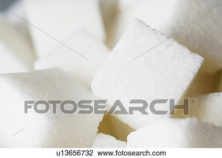 Stock Image - Studio shot of sugar cubes. Fotosearch