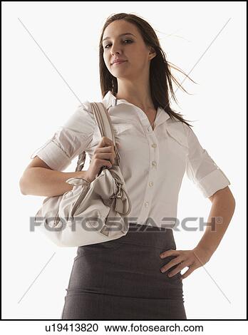 Studio shot of young woman View Large Photo Image Stock Image - Studio shot of young woman. Fotosearch