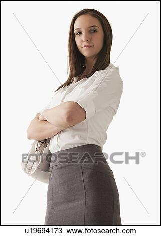 Stock Image - Studio shot of young woman. Fotosearch
