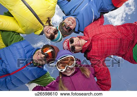 Three-generation family with girl (10-11) posing during ski holiday View Large Photo Image Stock Image - Three-generation family with girl (10-11) posing during ski holiday. Fotosearch