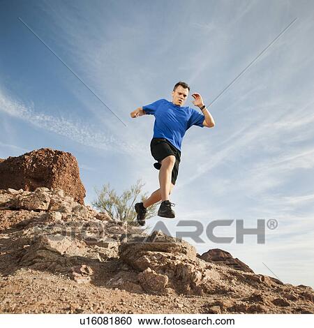 USA, Arizona, Phoenix, Mid adult man jogging on desert View Large Photo Image Stock Image - USA, Arizona, Phoenix, Mid adult man jogging on desert. Fotosearch