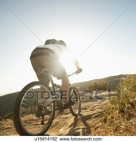 USA, California, Laguna Beach, Mountain biker riding downhill View Large Photo Image Stock Image - USA, California, Laguna Beach, Mountain biker riding downhill. Fotosearch