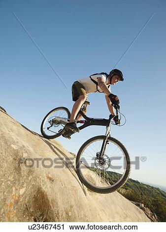 USA, California, Laguna Beach, Mountain biker riding downhill View Large Photo Image Stock Image - USA, California, Laguna Beach, Mountain biker riding downhill. Fotosearch