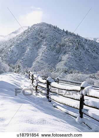 Picture - USA, Colorado, snowy ranch with pen. Fotosearch