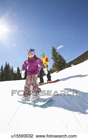 USA, Colorado, Telluride, Father and daughter (10-11) snowboarding View Large Photo Image Stock Image - USA, Colorado, Telluride, Father and daughter (10-11) snowboarding . Fotosearch