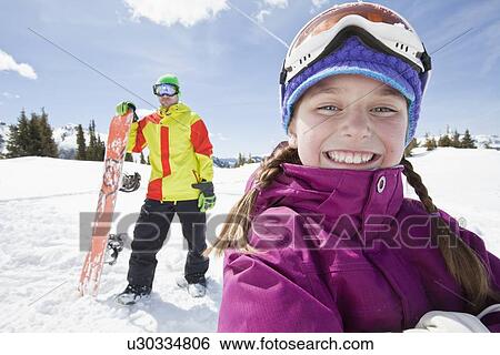 USA, Colorado, Telluride, Father and daughter (10-11) posing with snowboards in winter scenery View Large Photo Image Stock Photograph - USA, Colorado, Telluride, Father and daughter (10-11) posing with snowboards in winter scenery. Fotosearch