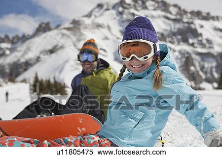 USA, Colorado, Telluride, Father and daughter (10-11) posing with snowboards in winter scenery View Large Photo Image Stock Photography - USA, Colorado, Telluride, Father and daughter (10-11) posing with snowboards in winter scenery. Fotosearch