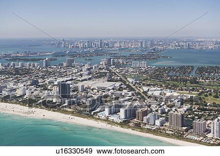 Stock Photo - USA, Florida, Miami, Cityscape with beach. Fotosearch