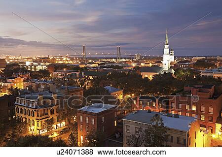Stock Photo - USA, Georgia, Savannah, Cityscape with Talmadge Memorial Bridge. Fotosearch