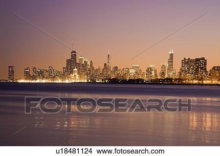 Picture - USA, Illinois, Chicago, City skyline over Lake Michigan. Fotosearch