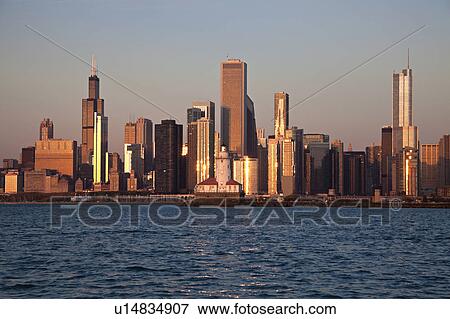 Stock Photo - USA, Illinois, Chicago, City skyline over Lake Michigan. Fotosearch
