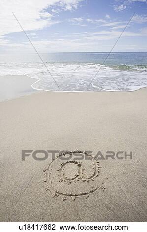 USA, Massachusetts, At sign drawn on sandy beach View Large Photo Image Stock Image - USA, Massachusetts, At sign drawn on sandy beach. Fotosearch