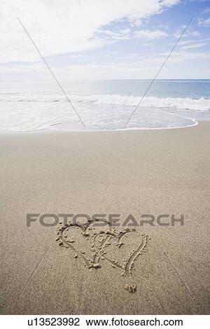 USA, Massachusetts, Hearts drawn on sandy beach View Large Photo Image Stock Image - USA, Massachusetts, Hearts drawn on sandy beach. Fotosearch