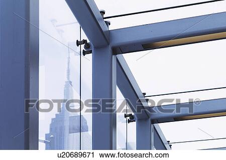 USA, New York, New York City, Empire State Building seen behind window frame View Large Photo Image Stock Image - USA, New York, New York City, Empire State Building seen behind window frame. Fotosearch