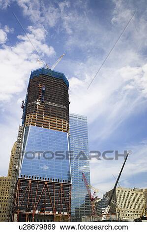 Stock Photo - USA, New York, New York City, Modern skyscrapers under construction at Ground Zero. Fotosearch