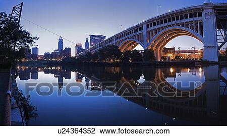 Stock Image - USA, Ohio, Cleveland, Veterans Memorial Bridge at dusk. Fotosearch