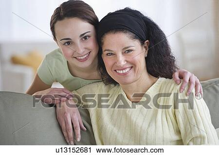 Woman with teenage daughter (14-15) View Large Photo Image Stock Image - Woman with teenage daughter (14-15). Fotosearch