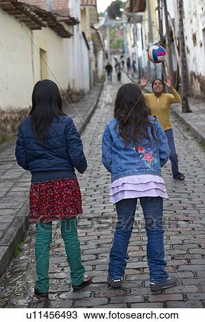 Children playing volleyball in a street, Cuzco, Peru View Large Photo Image Stock Image - Children playing volleyball in a street, Cuzco, Peru. Fotosearch