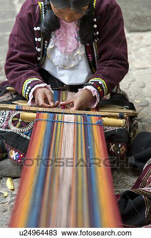 Close-up of a Peruvian woman weaving at Museo de Arte Precolombino, Cuzco, Peru View Large Photo Image Stock Image - Close-up of a Peruvian woman weaving at Museo de Arte Precolombino, Cuzco, Peru. Fotosearch