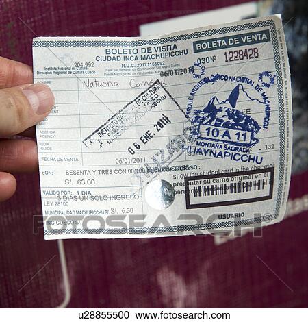Stock Image - Close-up of a travel ticket, Wayna Picchu, The Lost City of The Incas, Machu Picchu, Cusco Region, Peru. Fotosearch