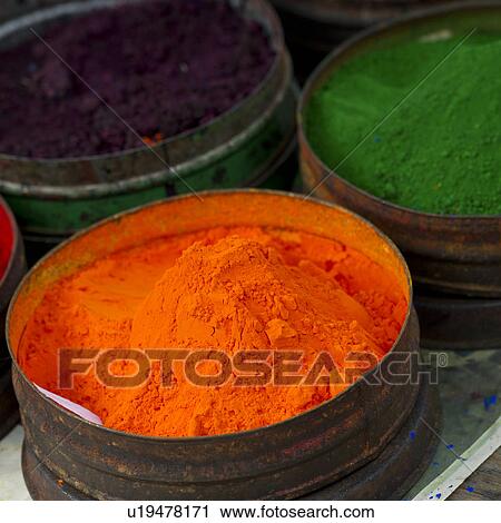 Stock Image - Close-up of powder paints at a market stall in Pisac, Sacred Valley, Cusco Region, Peru. Fotosearch