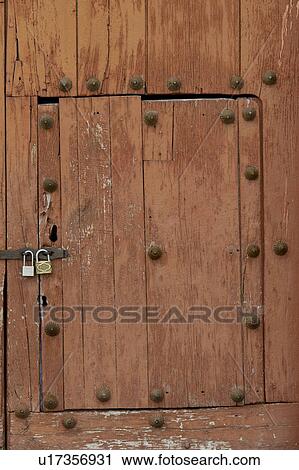 Stock Image - Closed door of a church, Maras, Sacred Valley, Cusco Region, Peru. Fotosearch
