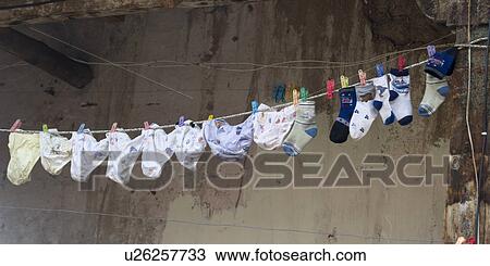 Stock Image - Clothes drying on a clothesline, Barrio De San Blas, Cuzco, Peru. Fotosearch