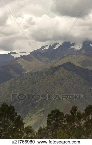 Clouds over a mountain range, Sacred Valley, Cusco Region, Peru View Large Photo Image Stock Image - Clouds over a mountain range, Sacred Valley, Cusco Region, Peru. Fotosearch