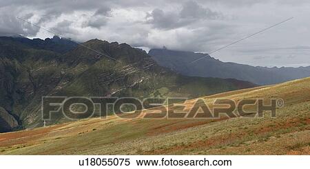 Stock Photography - Clouds over a mountain range, Sacred Valley, Cusco Region, Peru. Fotosearch