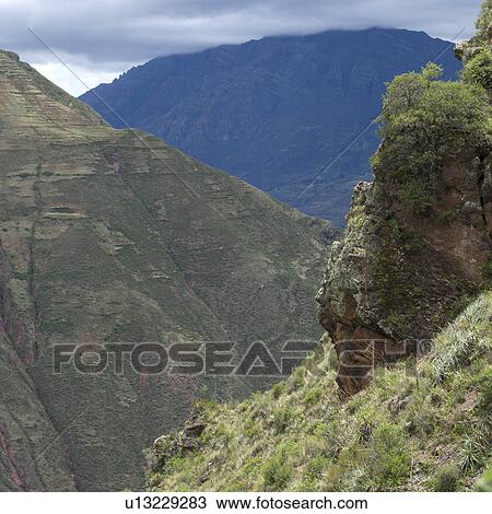 Clouds over mountains, Pisac, Sacred Valley, Cusco Region, Peru View Large Photo Image Stock Image - Clouds over mountains, Pisac, Sacred Valley, Cusco Region, Peru. Fotosearch