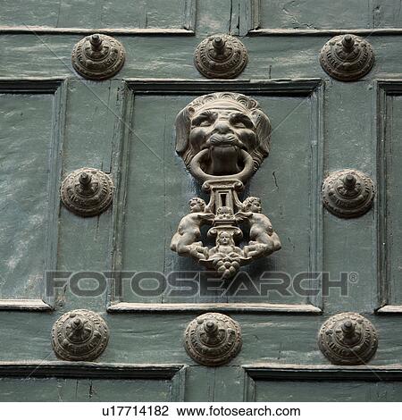 Stock Image - Door knob and rivets on a door, Cuzco, Peru. Fotosearch