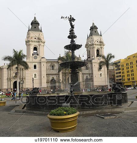 Stock Image - Fountain in front of Cathedral Of Lima, Plaza Mayor, Historic Centre of Lima, Lima, Peru. Fotosearch
