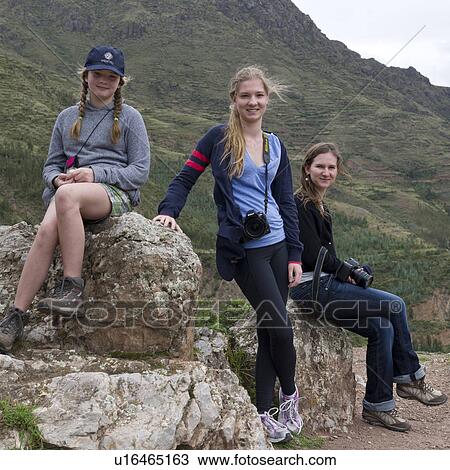 Stock Image - Friends at Archaeological Park of Pisac, Pisac, Sacred Valley, Cusco Region, Peru. Fotosearch