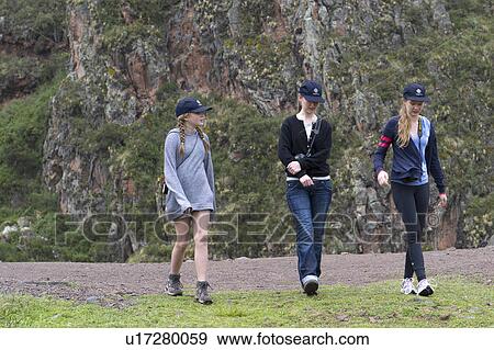 Friends walking at Archaeological Park of Pisac, Pisac, Sacred Valley, Cusco Region, Peru View Large Photo Image Stock Photo - Friends walking at Archaeological Park of Pisac, Pisac, Sacred Valley, Cusco Region, Peru. Fotosearch