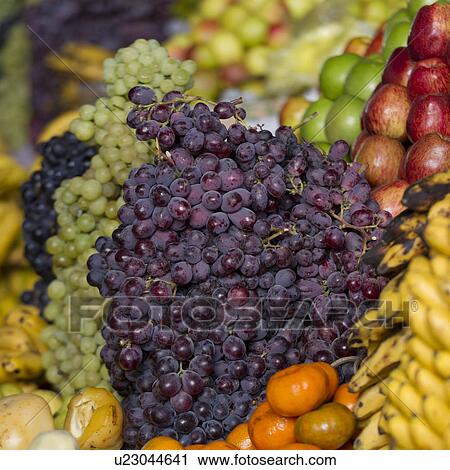 Stock Image - Grapes at a market stall, Mercado Central, Cuzco, Peru. Fotosearch