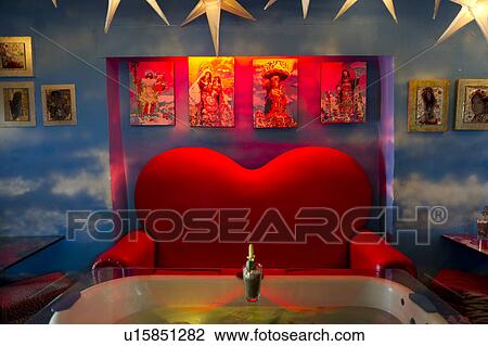Stock Image - Heart shaped chair with table in a room, Cuzco, Peru. Fotosearch