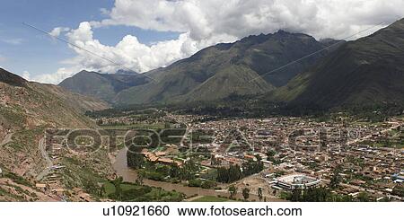 Stock Image - High angle view of a town, Urubamba, Sacred Valley, Cusco Region, Peru. Fotosearch