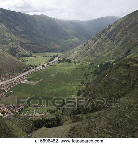 Stock Image - High angle view of a village in Pisac, Sacred Valley, Cusco Region, Peru. Fotosearch
