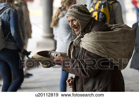 Stock Photo - Homeless man begging for money, Cuzco, Peru. Fotosearch