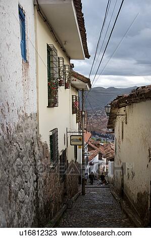 Stock Image - Houses along alley in Cuzco, Peru. Fotosearch