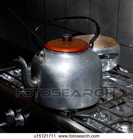 Kettle on a gas stove burner in a kitchen of a guesthouse, Willka Tika, Sacred Valley, Cusco Region, Peru View Large Photo Image Stock Image - Kettle on a gas stove burner in a kitchen of a guesthouse, Willka Tika, Sacred Valley, Cusco Region, Peru. Fotosearch