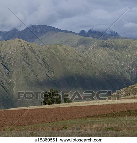 Landscape in front of a mountain range, Sacred Valley, Cusco Region, Peru View Large Photo Image Stock Image - Landscape in front of a mountain range, Sacred Valley, Cusco Region, Peru. Fotosearch