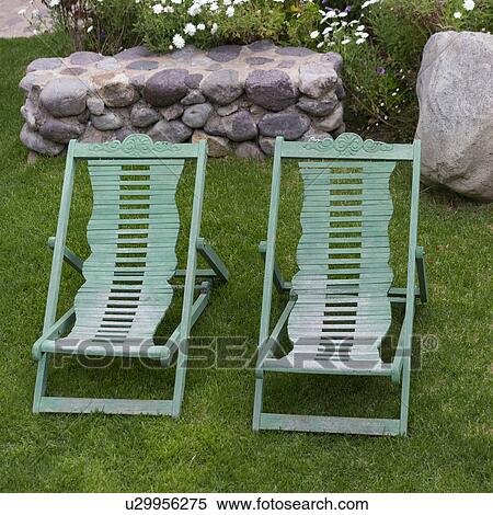 Lounge chairs in a garden of Willka Tika Guesthouse, Willka Tika, Sacred Valley, Cusco Region, Peru View Large Photo Image Stock Photography - Lounge chairs in a garden of Willka Tika Guesthouse, Willka Tika, Sacred Valley, Cusco Region, Peru. Fotosearch