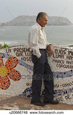 Stock Photo - Man standing at El Parque del Amor, Av De La Aviacion, Miraflores District, Lima Province, Peru. Fotosearch