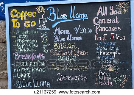 Stock Photo - Menu board at a restaurant, Pisac, Sacred Valley, Cusco Region, Peru. Fotosearch