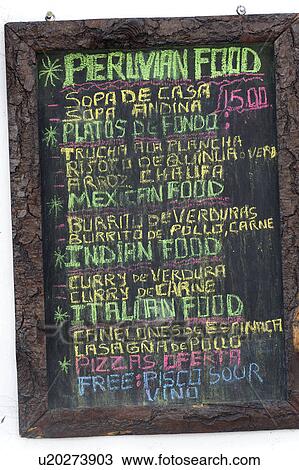 Stock Image - Menu on blackboard in Barrio De San Blas, Cuzco, Peru. Fotosearch