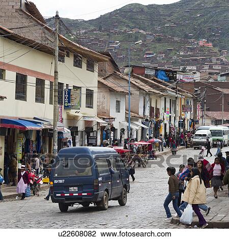 Stock Image - People in a street, Sacred Valley, Cusco Region, Peru. Fotosearch